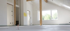 freshly cured concrete screed on construction site in loft in a family house