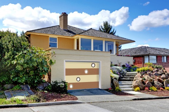 Modern caramel color house with garage.