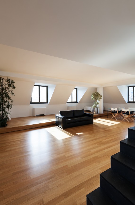 Interior, wide loft, hardwood floor, view living room