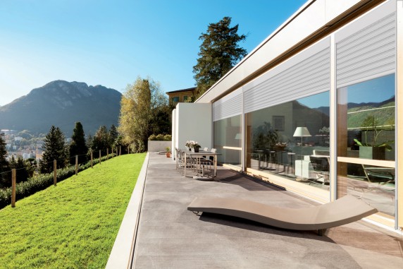 Beautiful modern house in cement, view from the garden